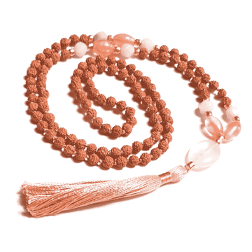 Tranquillity Mala Necklace – Rudraksha, Rose Quartz, Amazonite & Tourmalinated Quartz curled on table